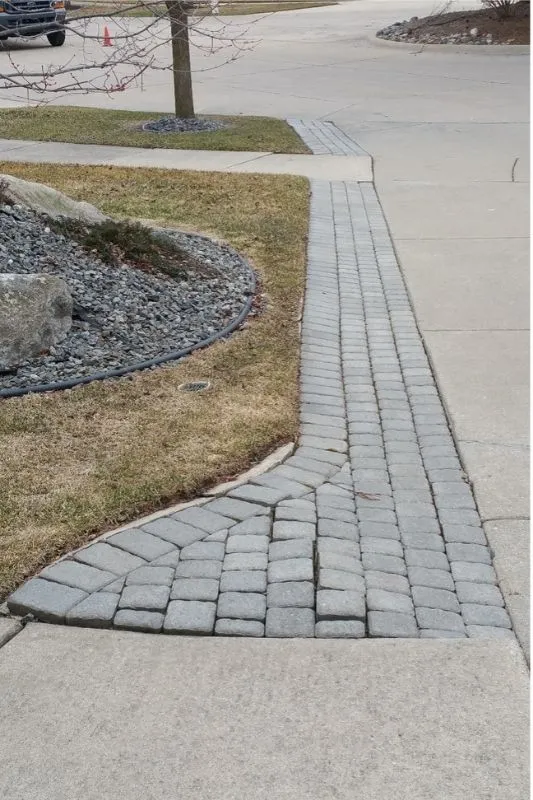Poor Paver work on street side